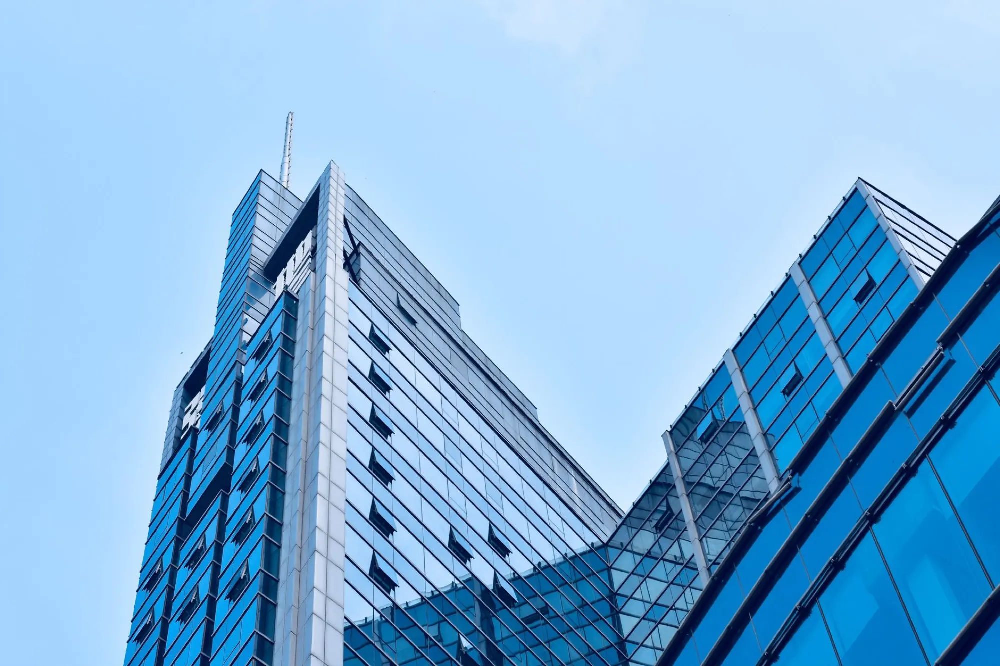 Blue glass corporate towers viewed from below, South Africa